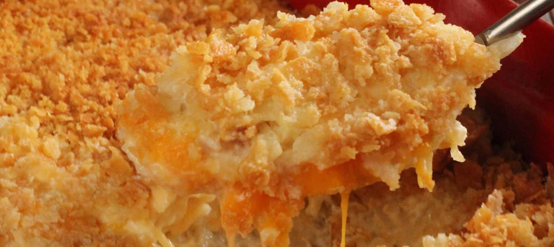 A spoonfull of cheesy hashbrown casserole