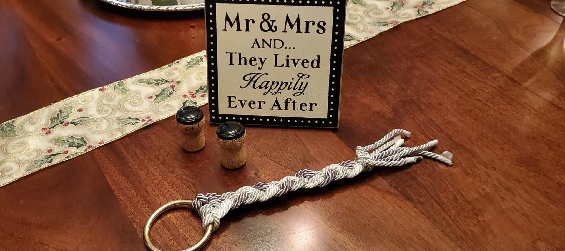 Mr & Mrs sign on table with braided cording